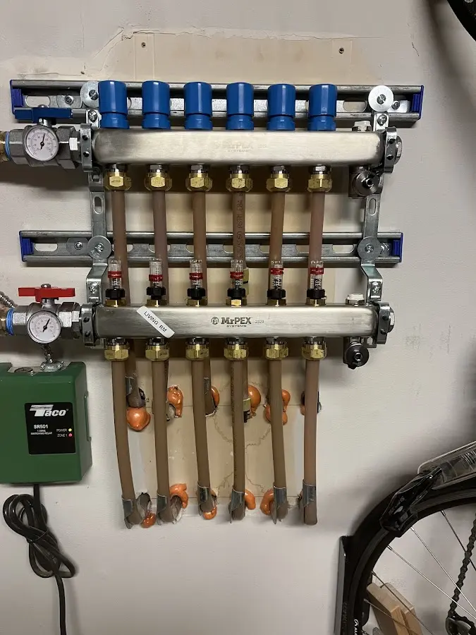 Plumber performing Gas Leak Detection at a residential property in Patchogue